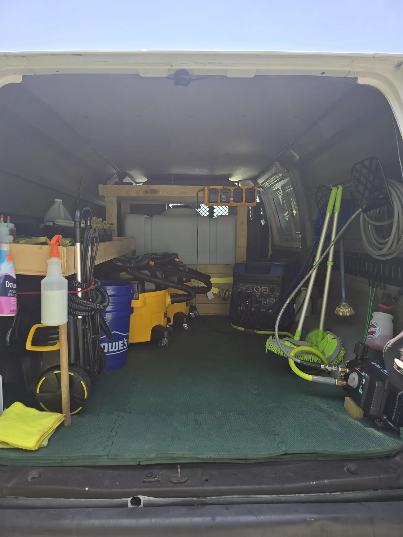 Inside the Emerald Auto Detailing van: water tank, inverter generator, vacuums and equipment stowed in place